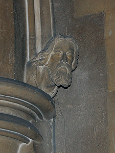 Head on the south side of the chancel arch June 2011
